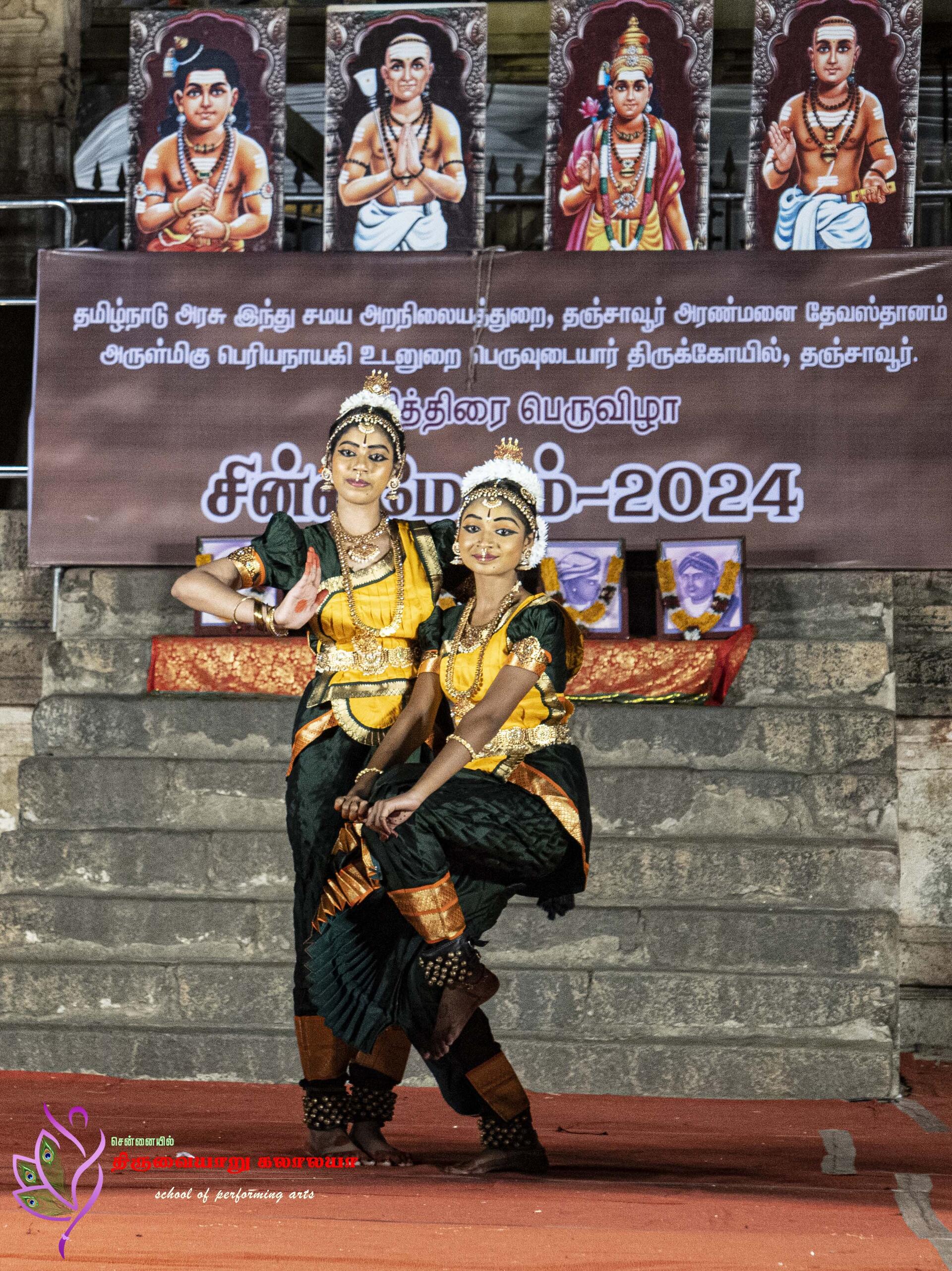 Guru guiding students in rehearsal
